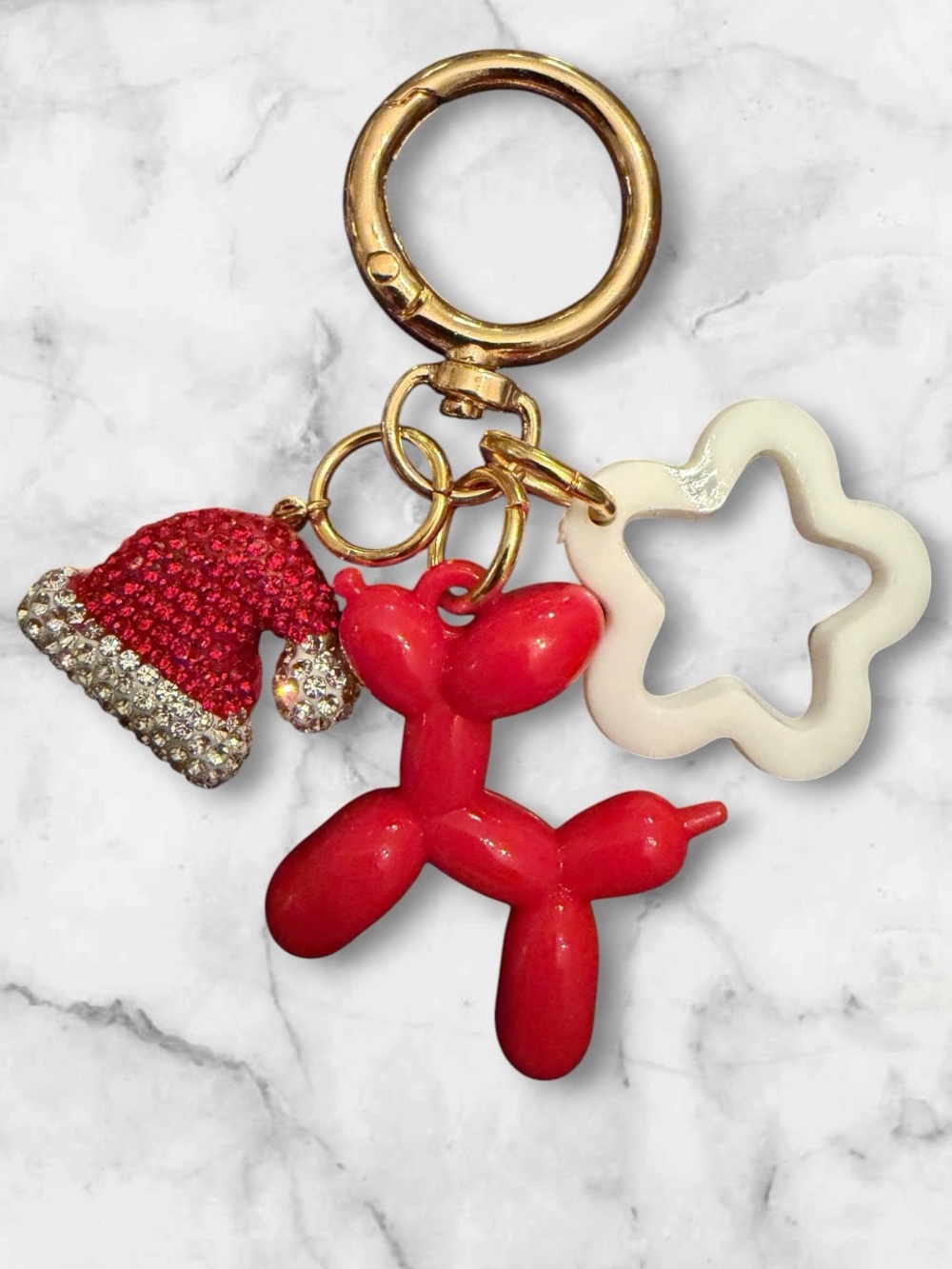 Festive Red Balloon Dog Keychain with White Star Charm